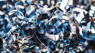 A closeup photo of metal shavings scraps.